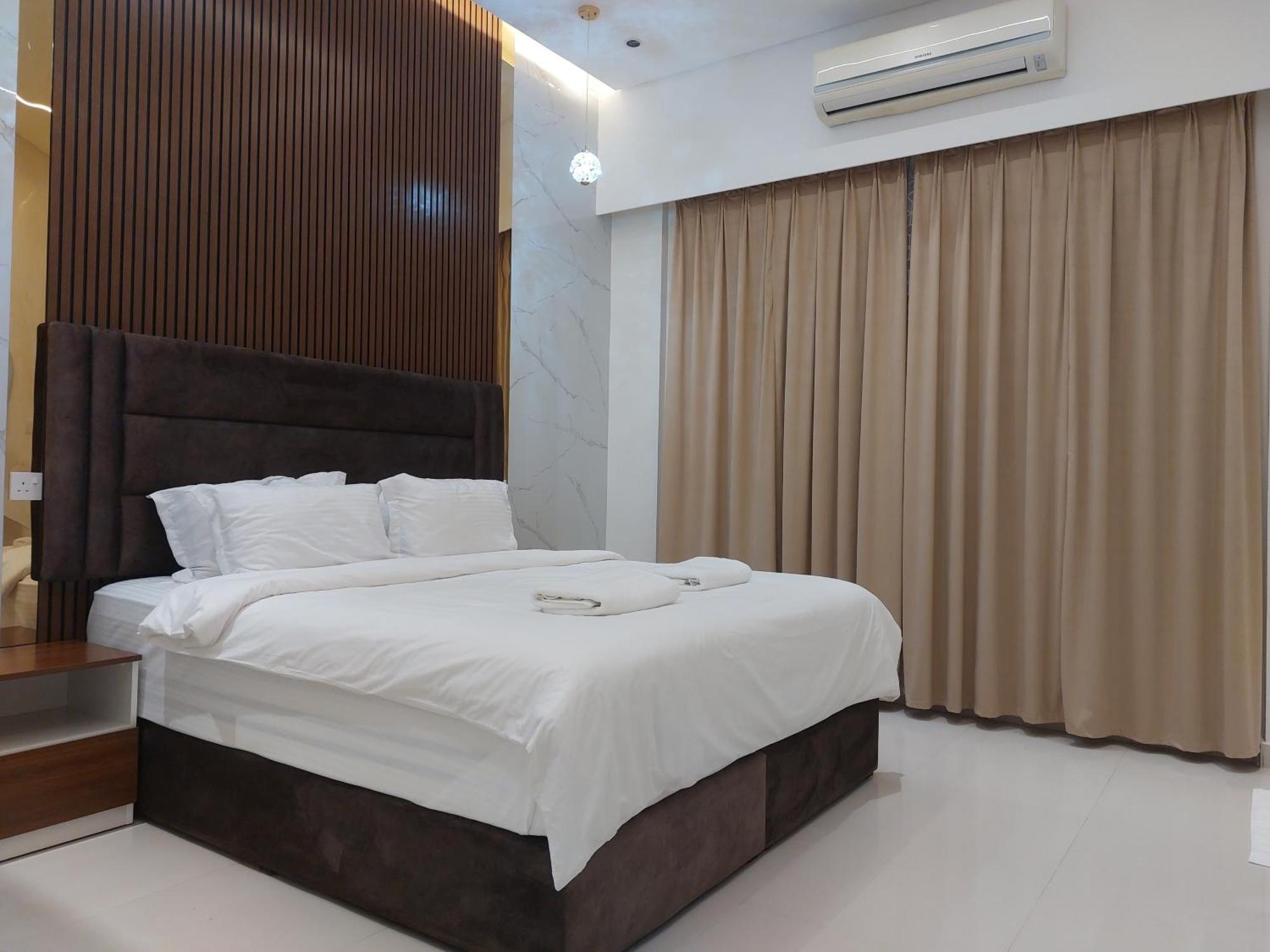 Mabahj Garnatha Hotel Apartments Сухар Екстериор снимка